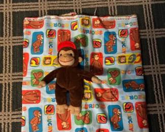 Curious George and fabric.