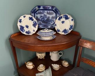 Early corner stand with grouping of early china, flo blue, wall vase.