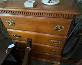 One of several maple chests of drawers.