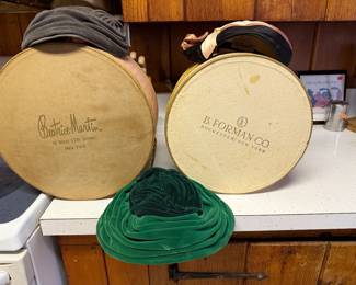 VIntage group of handmade hats and hat boxes.