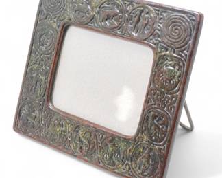 Lot 99 | Tiffany Studios (New York) 'Zodiac' Bronze 943 Easel Calendar, Early 20th C. H 7.1" W 8.3"