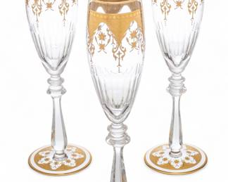 Lot 1054 | Baccarat (French, B. 1764) 'Gold Encrusted Prestige' Fluted Champagnes H 9.5" Dia. 2.9" 16 PCS
