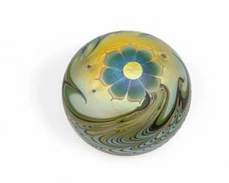 Lot 1086 | Lundberg Studios (American) Iridescent Art Glass Paperweight 1978 Dia. 3"