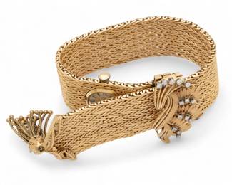 Lot 19 | French 14k Yellow Woven Gold & Diamonds Bracelet, Hidden Watch by Lura, Ca. 1940 L 9.7" 94g