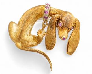 Lot 11 | Cartier (Paris) Daschund Dog 18kt Yellow Gold And Ruby Brooch H 1.3" W 1.6" 17g
