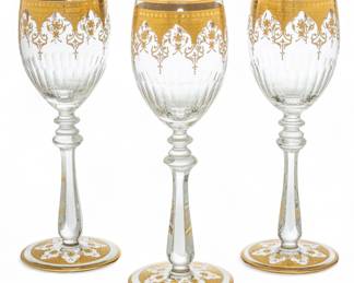 Lot 1055 | Baccarat (French, B. 1764) 'Gold Encrusted Prestige' Crystal White Wine Glasses H 7" Dia. 2.5" 18 PCS