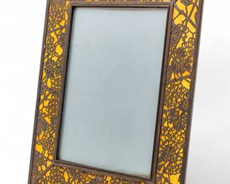 Lot 95 | Tiffany Studios (American) 'Grapevine' Etched Metal & Favrile Glass Photo Frame, Early 20th C. H 13" W 10.5"