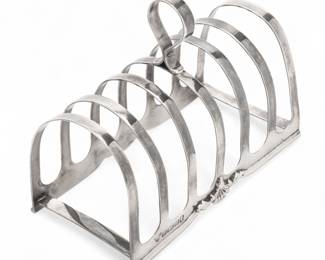 Lot 84 | Garrard & Co. Ltd. (London) Sterling Silver Toast Rack, 1977 H 4" W 2.6" L 5" 4t oz
