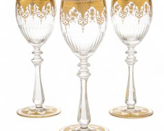 Lot 1053 | Baccarat (French, B. 1764) 'Gold Encrusted Prestige' Crystal Water Goblets H 8.3" Dia. 3.3" 15 PCS