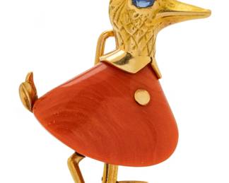 Lot 12 | Cartier (Paris) Vintage, Rainy Day 18k Yellow Gold, Coral, And Sapphire Duck Brooch H 1.5" W 1.3" L 0.3" 9.9g