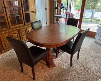 Dining table with two extra leaves