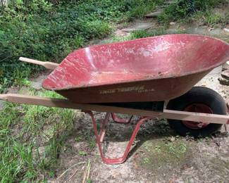 Red Metal Wheelbarrow with Wooden Handles