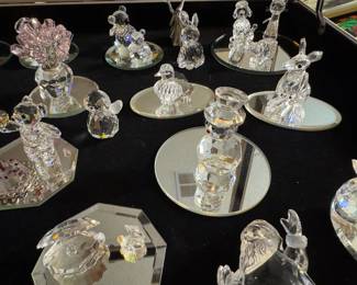 Large selection of Swarovski figurines and Christmas ornaments.