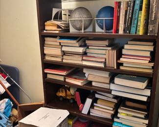 Tons of books - about three more shelves worth