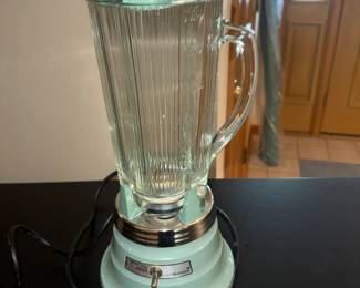 Vintage Waring Kitchen Blender
Step back into the stylish kitchens of the 1950s and ‘60s with this iconic Waring 2-Speed Blender, part of the sought-after Waring Kitchen Classics series, commonly known as the 700 Series. With its minty turquoise hue, this rare beauty isn’t just a kitchen appliance — it’s a showpiece for any retro enthusiast or vintage collector.