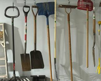 Lots of tools at this sale shovels, racks , ladders the list goes on and on