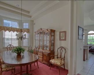 Dining Room Set. Lighted China cabinet by Ethan Allen