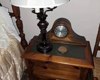Mantel click, lamp and nightstand