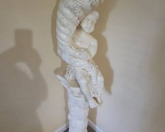 Vintage Tall white Plaster cherub holding a horn -sitting on a pedestal