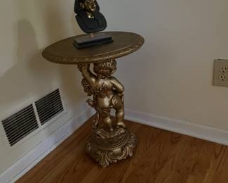 Gold cherub pedestal table