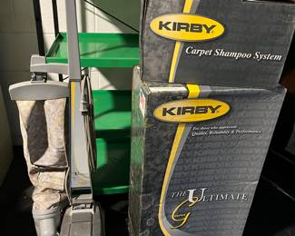 Kirby vacuum cleaner and boxes of all attachments including box with carpet shampoo sysyem! The Ultimate G.