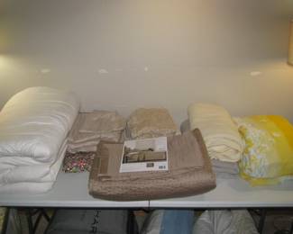 Linens include queen size sheets, feather bed and more.