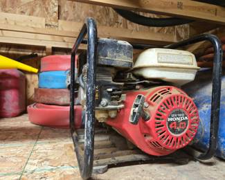Honda 2hp water pump with approx. 300 ft. Hose