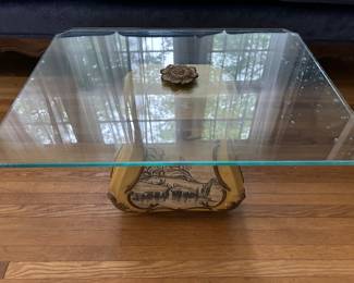 small glass top table with ceramic base