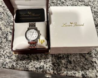 #100 - $85 - Lucien Piccard choregraph men's stainless watch