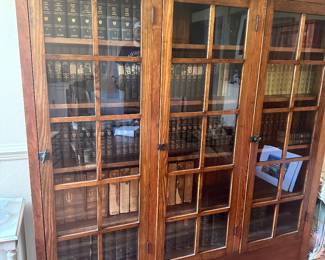 #9 - $600 - Glass front 3 door book shelf 70.5tx89.5wx12
