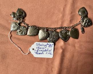 #86 - $80 - Sterling charm bracelet of hearts 1.02 oz