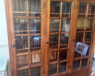 #9 - $600 - Glass front 3 door book shelf 70.5tx89.5wx12