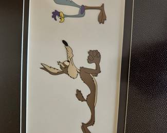 #65 - $90 - Wiley coyote & Road runner picture with leather matting 23x18