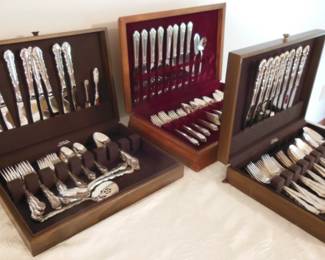 3 sets of flatware in case