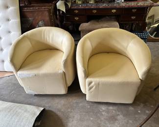 Rissanti mid century modern style leather chairs
