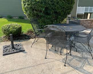 Vintage wrought iron patio sets ,with cushions and umbrella