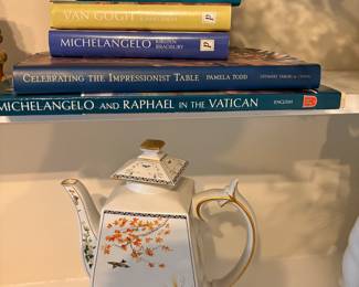 Teapot and art books