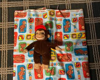 Curious George fabric and small monkey.