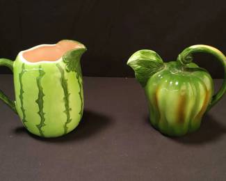 Pair of ceramic hand painted pitchers