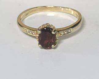 Sterling silver ring with garnet and diamonds