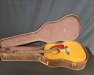 Vintage Gibson LG series acoustic guitar and case