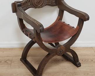 Vintage Savonarola arm chair with leather seat