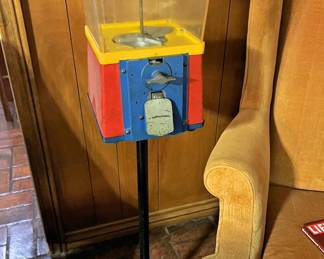 Vintage bubble gum machine on stand. We also have a similar table top model.