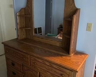 Dresser has 2 matching nightstands that go with it.