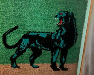 Tufted panther wall hanging