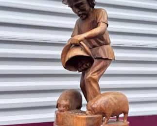 12” Hand-Carved Wood Sculpture – Farmer Feeding Pigs