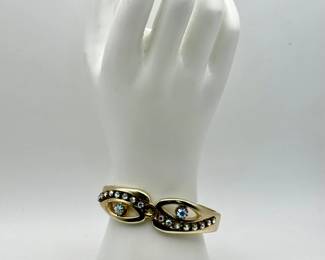 Vintage Aurora Borealis Rhinestone Eye Clamper Bracelet – Mid-Century Gold Tone