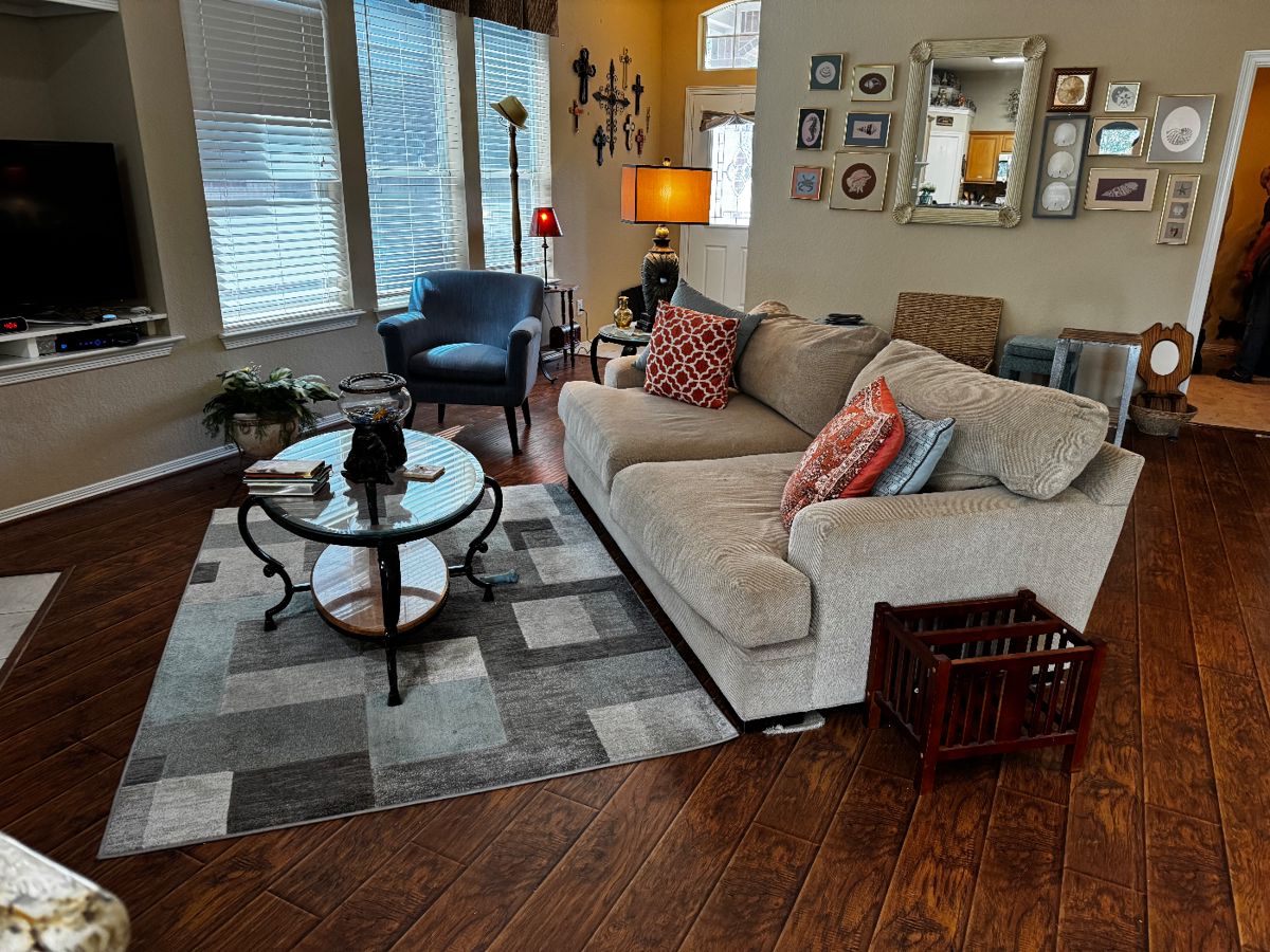 Urban living at its finest. Extremely well maintained furniture, coffee table with matching side table. Blue side chair