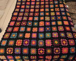 Brightly Colored Crocheted Afghan with Scalloped Edges