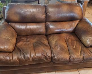 Leather Loveseat- available for resale by appointment.